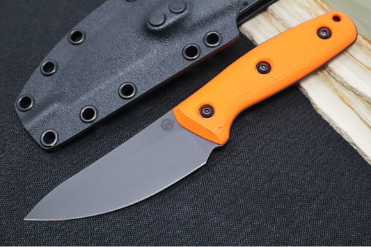 Schwarz Designs Confidante - Orange G-10 Handle / Magnacut Blade / Black Cerakote Finish / Black Kydex Sheath