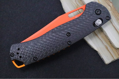Benchmade 15535OR-01 Taggedout Manual Folder - CPM-Magnacut Steel / Clip Point Blade with Orange Cerakote / Black Carbon Fiber Handle