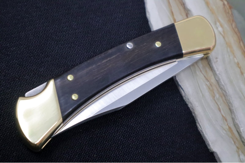 Buck 110 Folding Hunter - Clip Point Blade / Stainless Steel / Ebony Wood Handle / Genuine Leather Sheath 0110BRS-B