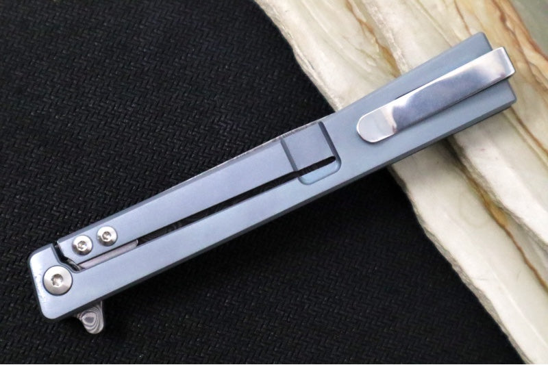 Ocaso Knives Solstice Damascus Flipper - Premium 120-layer Damascus Steel / Straight Blade / Dark Matter Blue Carbon Fiber & Blue Anodized Titanium Handle #101FB - Northwest Knives