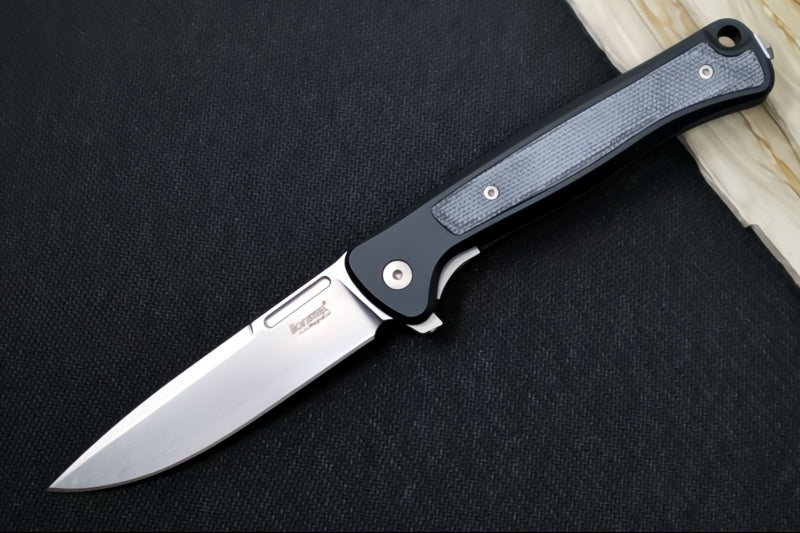 Lionsteel Skinny Integral Flipper - Drop Point Blade / CPM-Magnacut Steel / Black Aluminum Handles with Black Canvas Micarta Inlay SK01ABS