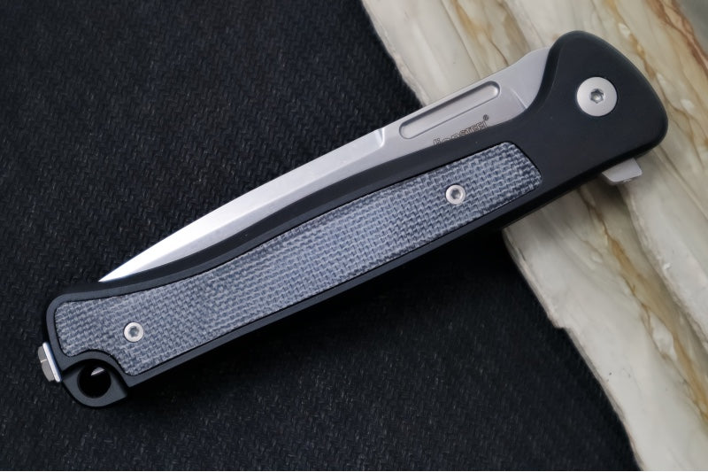 Lionsteel Skinny Integral Flipper - Drop Point Blade / CPM-Magnacut Steel / Black Aluminum Handles with Black Canvas Micarta Inlay SK01ABS