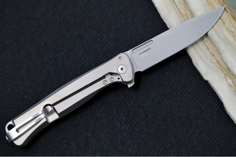 Lionsteel Skinny Integral Flipper - Drop Point Blade / CPM-Magnacut Steel / Grey Titanium Handles with Black Carbon Fiber Inlays SK01GY