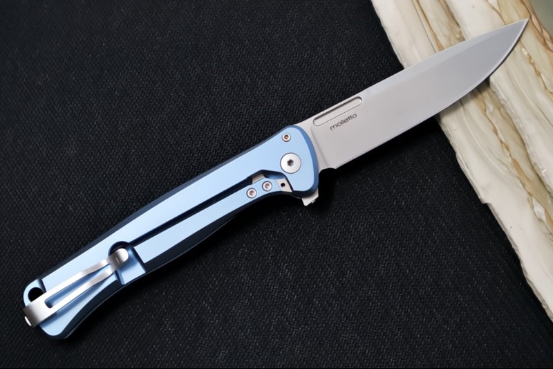 Lionsteel Skinny Integral Flipper - Drop Point Blade / CPM-Magnacut Steel / Blue Anodized Titanium Handles with Blue Dark Matter Carbon Fiber Inlay SK01BL