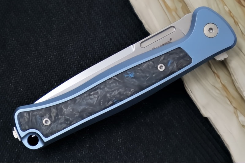 Lionsteel Skinny Integral Flipper - Drop Point Blade / CPM-Magnacut Steel / Blue Anodized Titanium Handles with Blue Dark Matter Carbon Fiber Inlay SK01BL