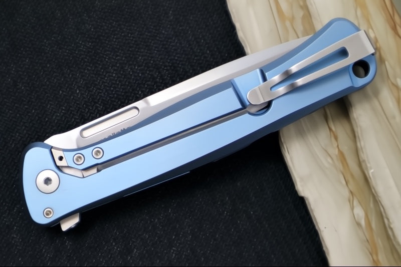Lionsteel Skinny Integral Flipper - Drop Point Blade / CPM-Magnacut Steel / Blue Anodized Titanium Handles with Blue Dark Matter Carbon Fiber Inlay SK01BL