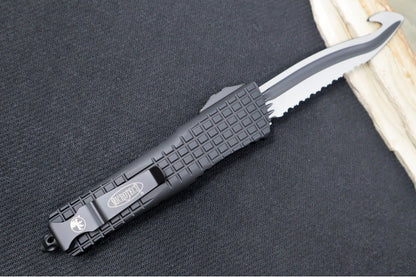 Microtech Combat Troodon Signature Series OTF Frag HS Rescue - Black Finish / Drop Point Blade with Rescue Hook / Black Anodized Aluminum Handle in a Frag Pattern 601-3THS