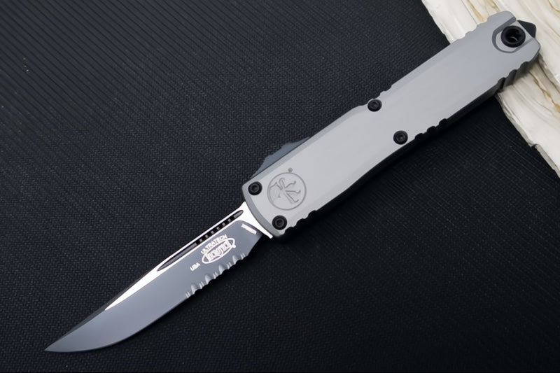 Microtech Ultratech ZBP (Zero Blade Play) OTF - Black Finish / Single Edge with Partial Serrate / Natural Clear Anodized Aluminum Handle 1121-2NC