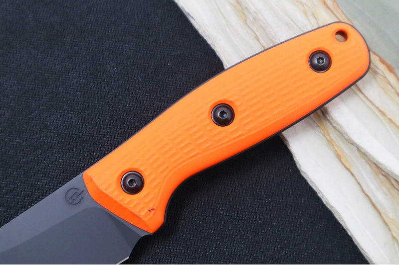 Schwarz Designs Confidante - Orange G-10 Handle / Magnacut Blade / Black Cerakote Finish / Black Kydex Sheath