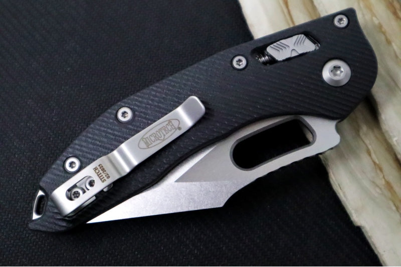 Microtech Stitch RAM-Lock Manual - Spear Point Blade with Partial Serrate / Stonewashed Finish / Black Fluted G-10 Handle 169RL-11FLGTBK