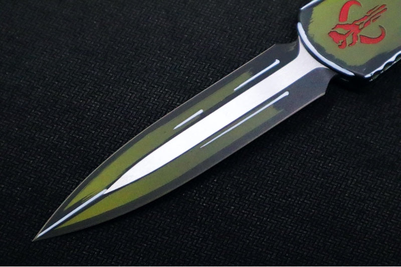 Heretic Knives Manticore-X Bounty Hunter OTF - Bounty Hunter Green Aluminum with CamoCarbon Top / Dagger Blade / CPM-Magnacut Steel / Green Cel Shade Bounty Hunter Blade Finish H032-CSG-BOUNTY