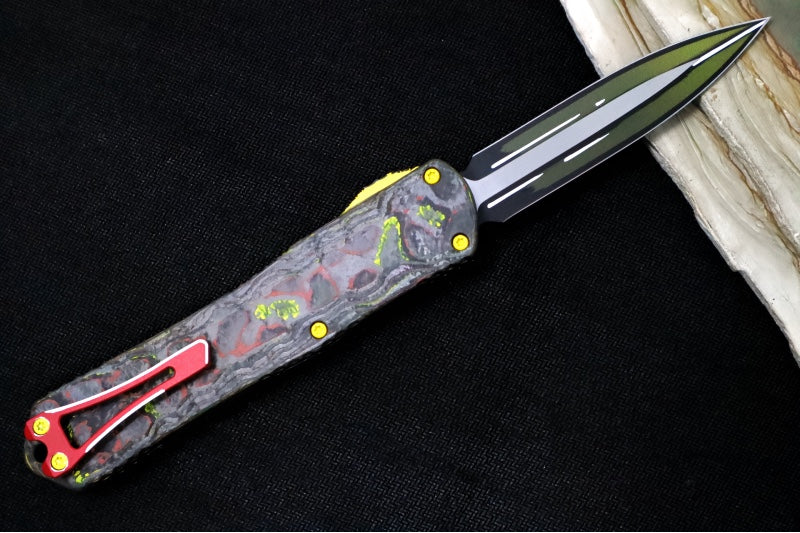 Heretic Knives Manticore-X Bounty Hunter OTF - Bounty Hunter Green Aluminum with CamoCarbon Top / Dagger Blade / CPM-Magnacut Steel / Green Cel Shade Bounty Hunter Blade Finish H032-CSG-BOUNTY