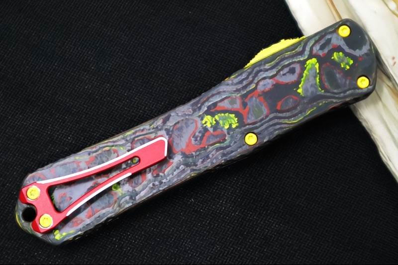 Heretic Knives Manticore-X Bounty Hunter OTF - Bounty Hunter Green Aluminum with CamoCarbon Top / Dagger Blade / CPM-Magnacut Steel / Green Cel Shade Bounty Hunter Blade Finish H032-CSG-BOUNTY