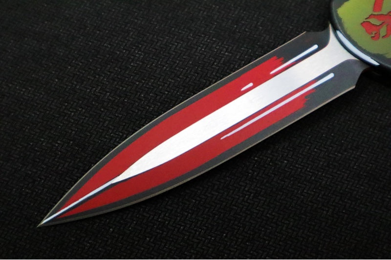 Heretic Knives Manticore-X Bounty Hunter OTF - Bounty Hunter Red Aluminum with CamoCarbon Top / Dagger Blade / CPM-Magnacut Steel / Red Cel Shade Bounty Hunter Blade Finish H032-CSR-BOUNTY - Northwest Knives