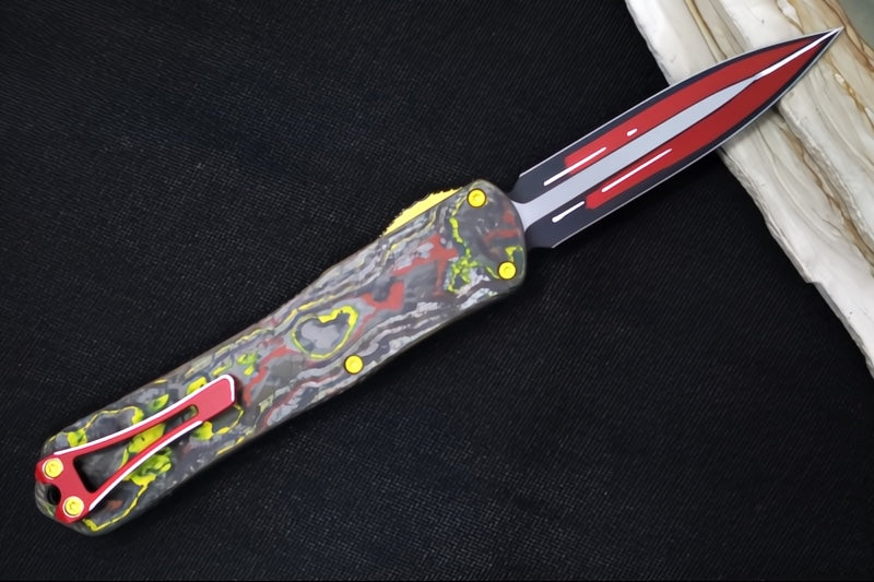 Heretic Knives Manticore-X Bounty Hunter OTF - Bounty Hunter Red Aluminum with CamoCarbon Top / Dagger Blade / CPM-Magnacut Steel / Red Cel Shade Bounty Hunter Blade Finish H032-CSR-BOUNTY - Northwest Knives