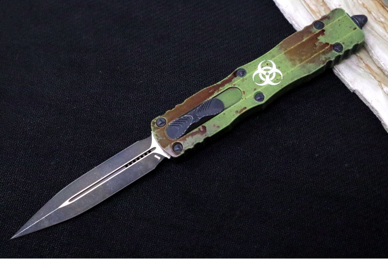 Microtech Dirac Delta OTF Outbreak - Double Edge / Dirty Apocalyptic Finish / Green Anodized Aluminum Handle with Blood Splatter 227-1OBDS