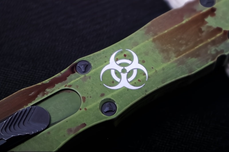 Microtech Dirac Delta OTF Outbreak - Double Edge / Dirty Apocalyptic Finish / Green Anodized Aluminum Handle with Blood Splatter 227-1OBDS - Northwest Knives