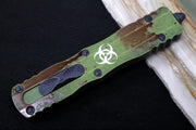 Microtech Dirac Delta OTF Outbreak - Double Edge / Dirty Apocalyptic Finish / Green Anodized Aluminum Handle with Blood Splatter 227-1OBDS - Northwest Knives