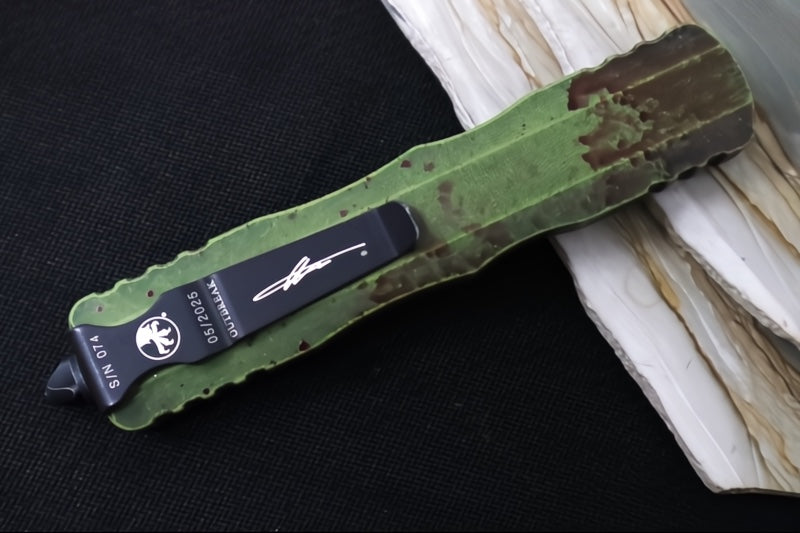 Microtech Dirac Delta OTF Outbreak - Double Edge / Dirty Apocalyptic Finish / Green Anodized Aluminum Handle with Blood Splatter 227-1OBDS - Northwest Knives