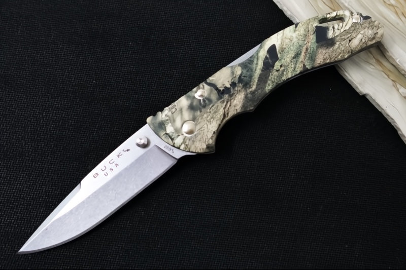 Buck Bantam 285 Folding Hunter - Clip Point Blade / Stainless Steel / Glass Reinforced Textured Nylon with Mossy Oak Country Camo Pattern 0285CMS24-B