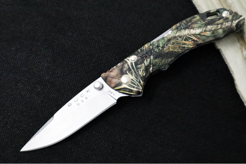 Buck Bantam 284 Folding Hunter - Clip Point Blade / Stainless Steel / Glass Reinforced Textured Nylon with Mossy Oak Country Camo Pattern 0284CMS24-B - Northwest Knives