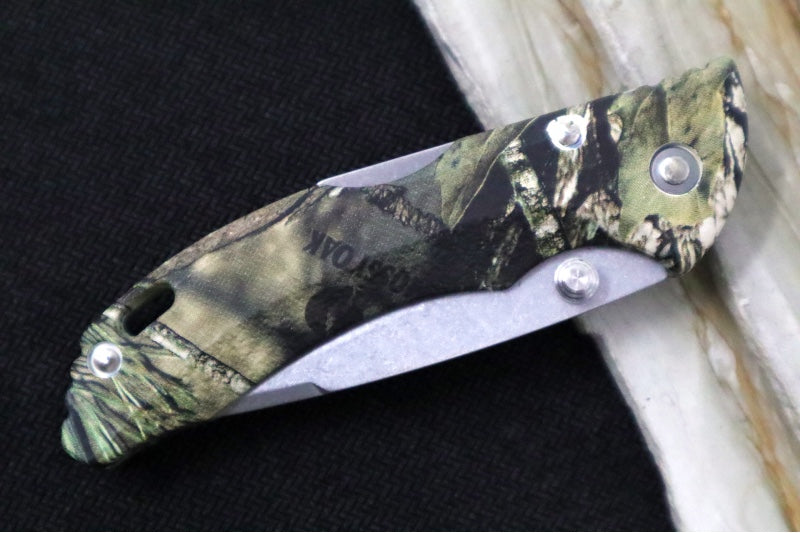 Buck Bantam 284 Folding Hunter - Clip Point Blade / Stainless Steel / Glass Reinforced Textured Nylon with Mossy Oak Country Camo Pattern 0284CMS24-B