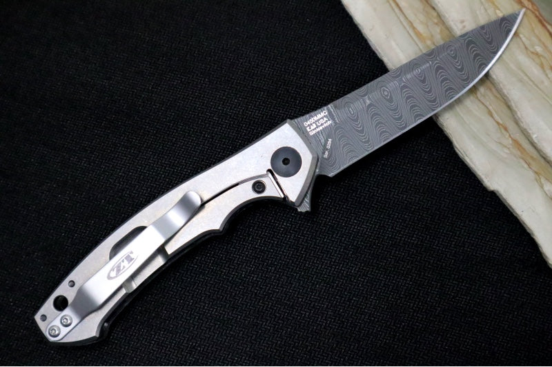Zero Tolerance 0450CFDAMS Sinkevich Titanium Flipper - Black/Blue Fat Carbon Fiber Handle / Vegas Forged Damascus Blade
