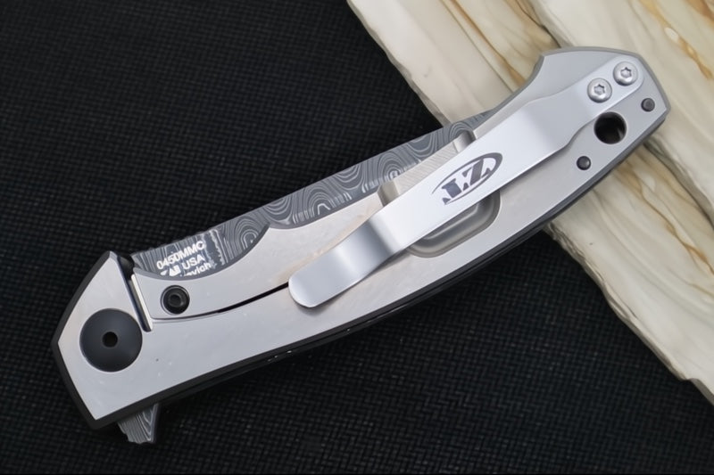 Zero Tolerance 0450CFDAMS Sinkevich Titanium Flipper - Black/Blue Fat Carbon Fiber Handle / Vegas Forged Damascus Blade