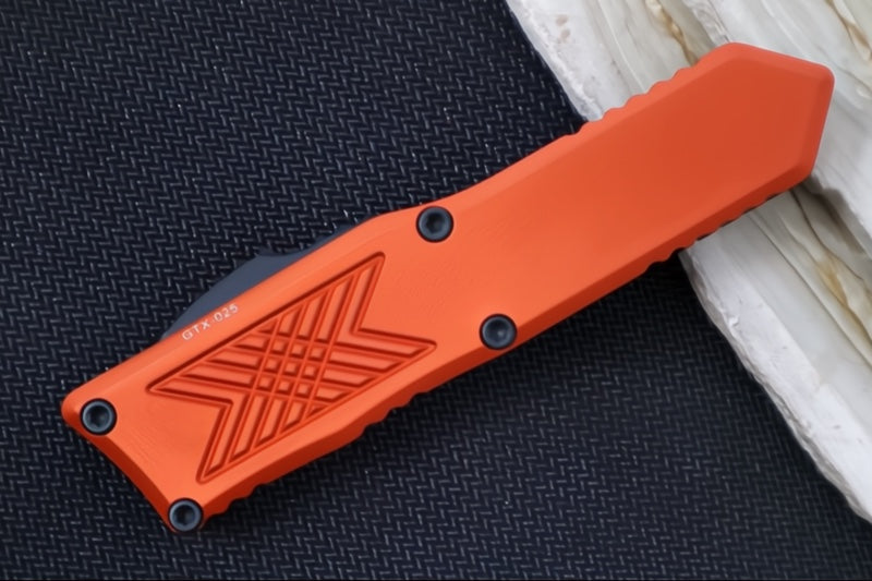 Guardian Tactical GTX-025 OTF - 2-Toned Black Finish / Elmax Steel / Drop Point Blade / Burnt Orange Anodized Aluminum Handle 12-4211