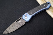 Lionsteel Twain Solid Button Lock Folder - Drop Point Blade / Scrambled Chad Nichols Damascus Steel / Blue Titanium Handles with Integral Carbon Fiber Inlay TW-D-BL - Northwest Knives