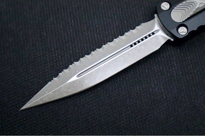 Microtech Dirac Delta OTF - ApocalyptiC Finish / Full Serrated Dagger Blade / Black Aluminum Handle 227-12AP