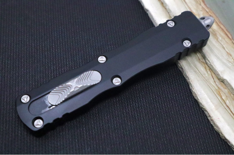Microtech Dirac Delta OTF - ApocalyptiC Finish / Full Serrated Dagger Blade / Black Aluminum Handle 227-12AP