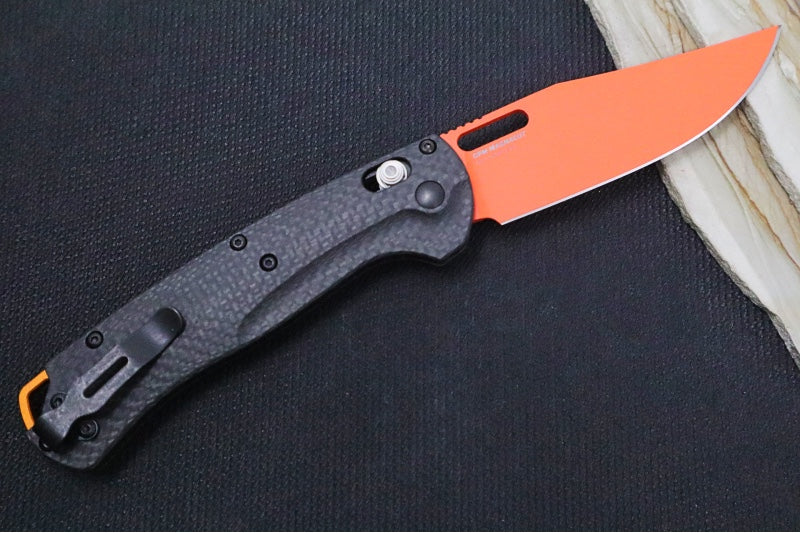 Benchmade 15535OR-01 Taggedout Manual Folder - CPM-Magnacut Steel / Clip Point Blade with Orange Cerakote / Black Carbon Fiber Handle - Northwest Knives