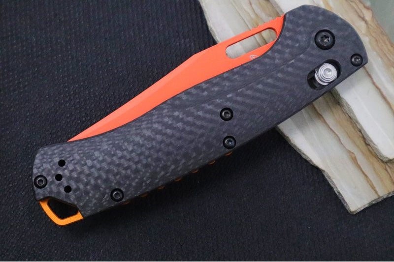 Benchmade 15535OR-01 Taggedout Manual Folder - CPM-Magnacut Steel / Clip Point Blade with Orange Cerakote / Black Carbon Fiber Handle