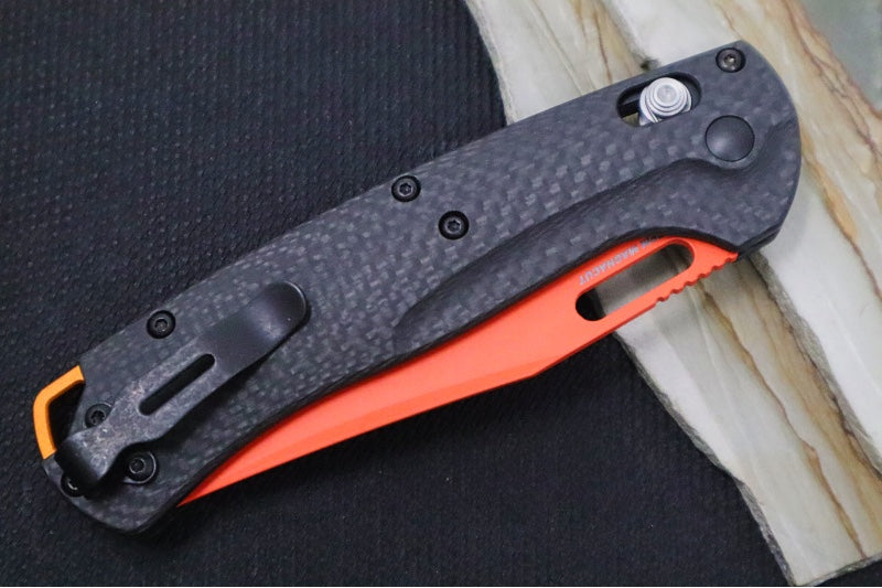 Benchmade 15535OR-01 Taggedout Manual Folder - CPM-Magnacut Steel / Clip Point Blade with Orange Cerakote / Black Carbon Fiber Handle