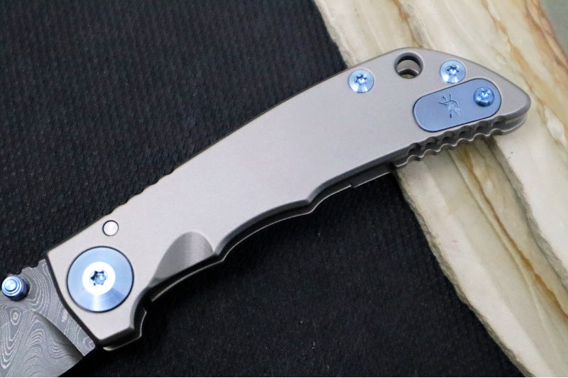 Spartan Blades HARSEY Titanium Folder 3.25 - Drop Point Blade / Damascus / Stonewashed Titanium Handle & Blue Ano Accents SF10DMBL