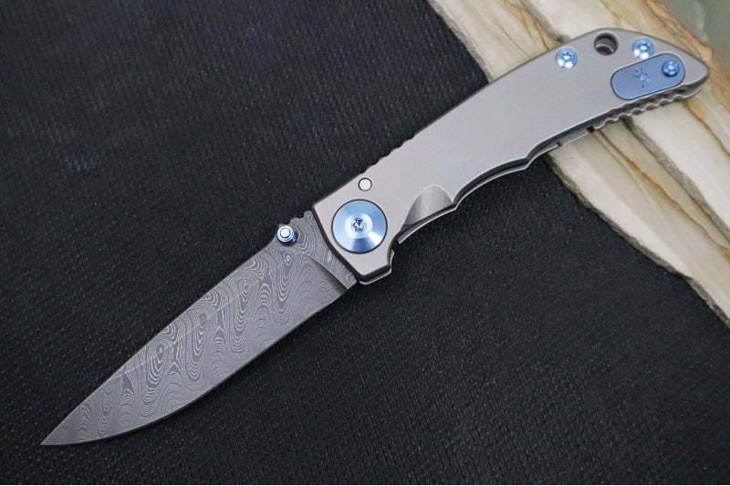 Spartan Blades HARSEY Titanium Folder 3.25 - Drop Point Blade / Damascus / Stonewashed Titanium Handle & Blue Ano Accents SF10DMBL