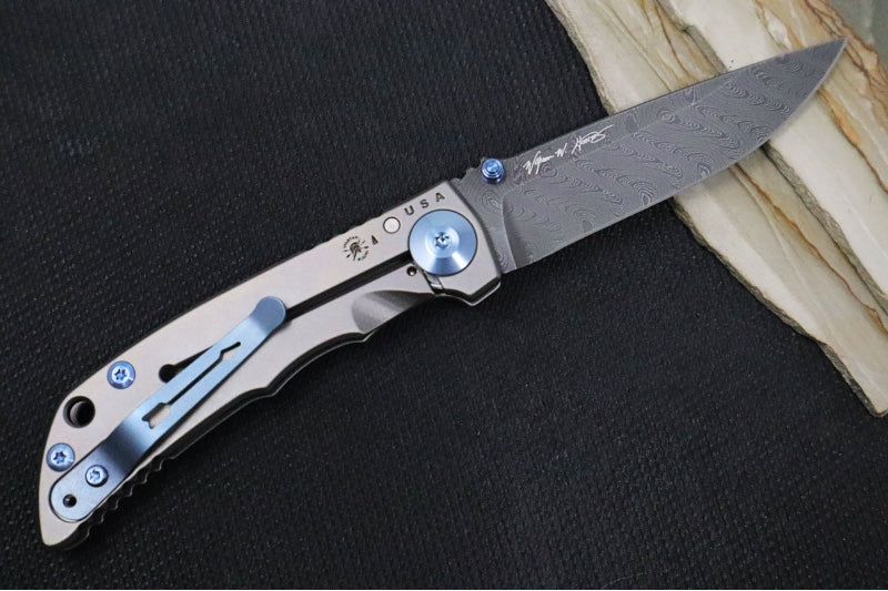 Spartan Blades HARSEY Titanium Folder 3.25 - Drop Point Blade / Damascus / Stonewashed Titanium Handle & Blue Ano Accents SF10DMBL - Northwest Knives