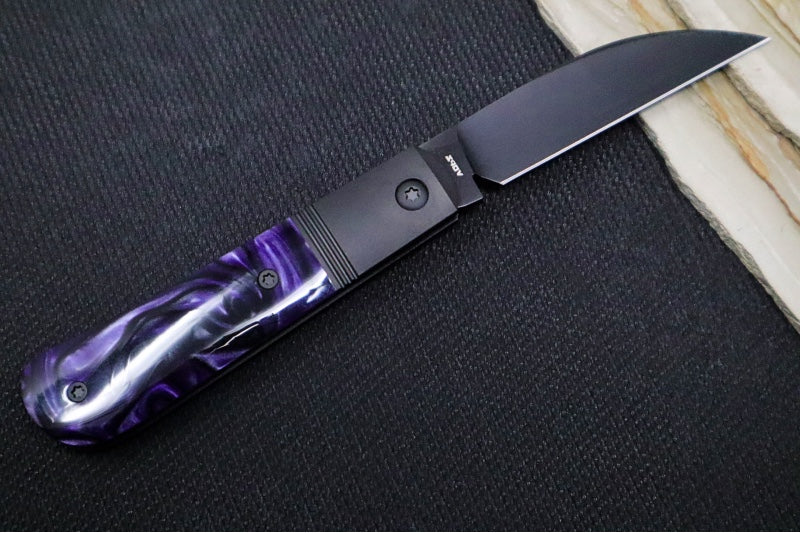 Jack Wolf Knives Laid Back Jack Slip Joint - Purple Kirinite Handle / Black DLC Titanium Bolsters / CPM-S90V Steel / Black DLC Wharncliffe Blade