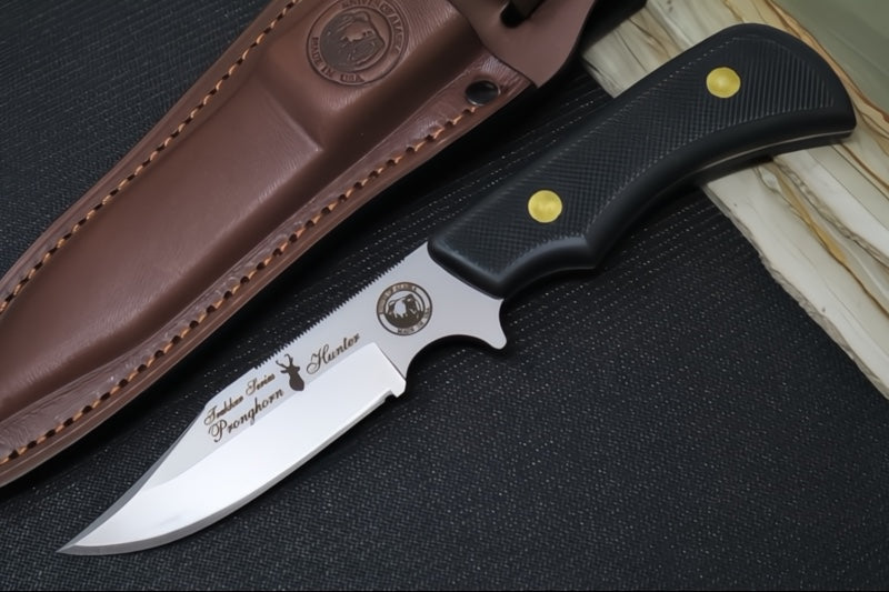 Knives of Alaska Trekker Pronghorn Fixed Blade - Black Surgrip Handle / D2 Tool Steel / Clip Point Blade / Brown Leather Sheath 00160FG
