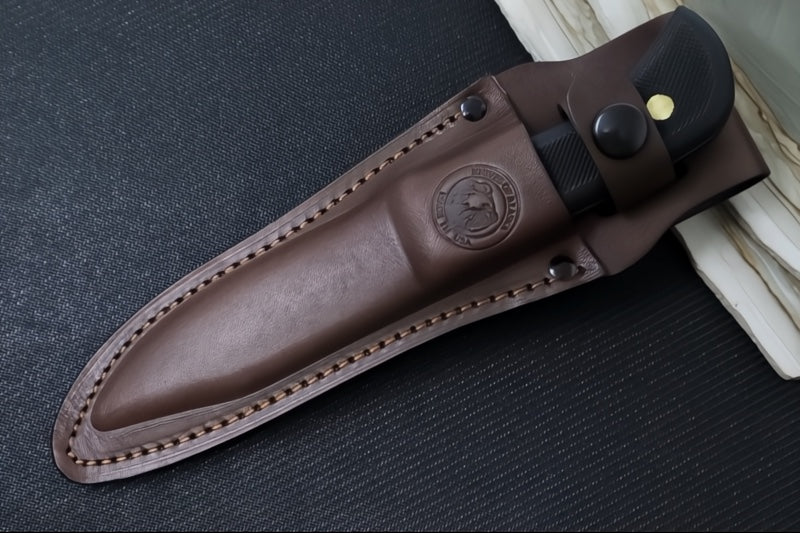 Knives of Alaska Trekker Pronghorn Fixed Blade - Black Surgrip Handle / D2 Tool Steel / Clip Point Blade / Brown Leather Sheath 00160FG