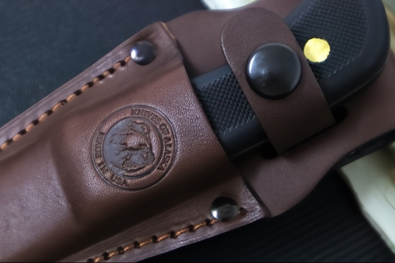 Knives of Alaska Trekker Pronghorn Fixed Blade - Black Surgrip Handle / D2 Tool Steel / Clip Point Blade / Brown Leather Sheath 00160FG