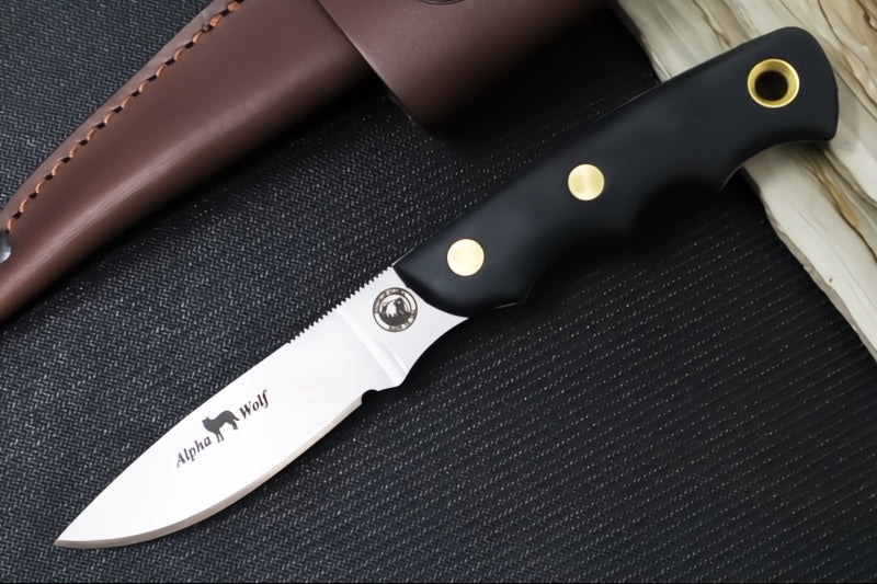 Knives of Alaska Alpha Wolf Fixed Blade - Black Surgrip Handle / D2 Tool Steel / Drop Point Blade / Brown Leather Sheath 00326FG