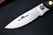 Knives of Alaska Alpha Wolf Fixed Blade - Black Surgrip Handle / D2 Tool Steel / Drop Point Blade / Brown Leather Sheath 00326FG - Northwest Knives