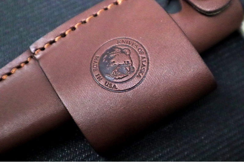 Knives of Alaska Alpha Wolf Fixed Blade - Black Surgrip Handle / D2 Tool Steel / Drop Point Blade / Brown Leather Sheath 00326FG