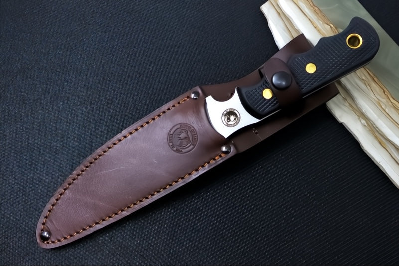Knives of Alaska Bush Camp Fixed Blade - Black Surgrip Handle / D2 Tool Steel / Drop Point Blade / Brown Leather Sheath 00014FG