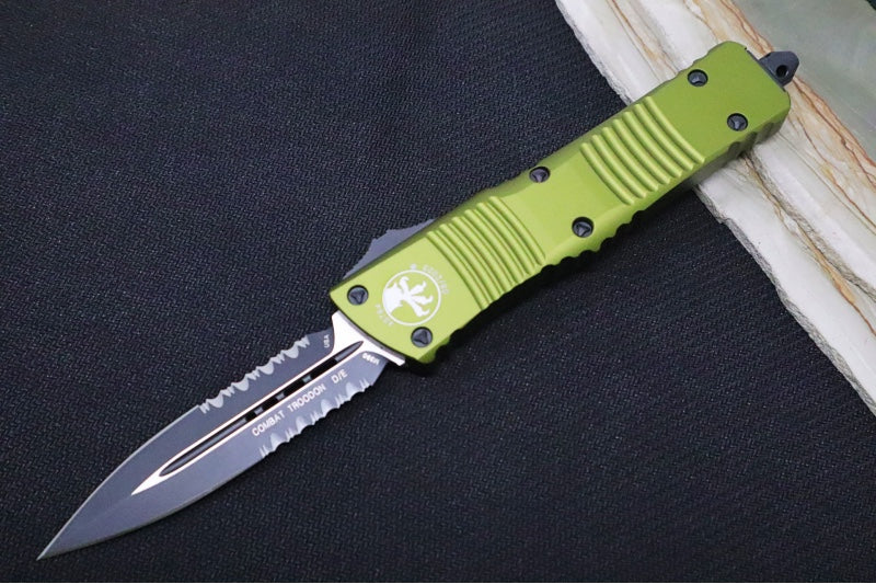 Microtech Combat Troodon OTF - Black Finish / Dagger Blade with Partial Serrates / Green Aluminum Handle - 142-2OD