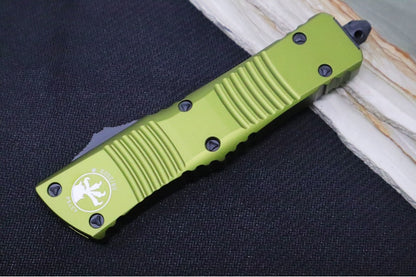 Microtech Combat Troodon OTF - Black Finish / Dagger Blade with Partial Serrates / Green Aluminum Handle - 142-2OD