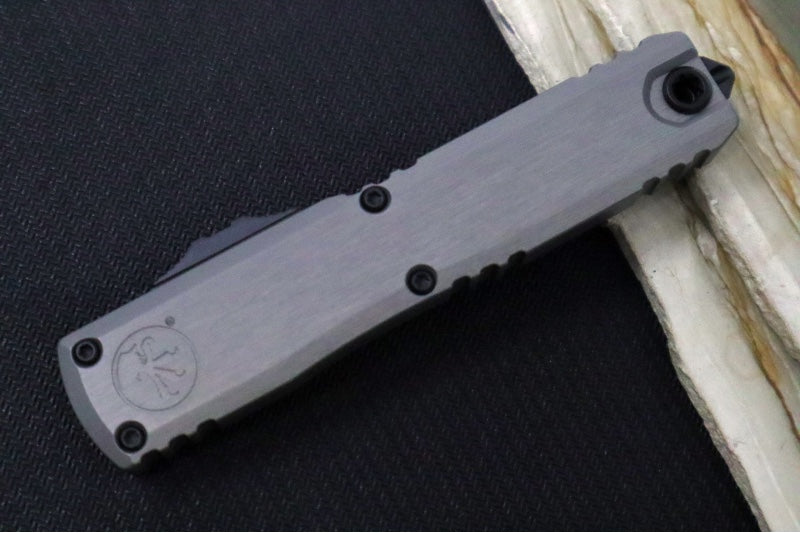 Microtech Ultratech ZBP (Zero Blade Play) OTF - Black Finish / Tanto Blade / Natural Clear Anodized Aluminum Handle 1123-1NC