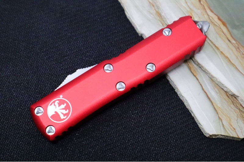 Microtech UTX-85 OTF - Single Edge with Partial Serrates / Stonewash Finish / Red Anodized Aluminum Handle - 231-11RD